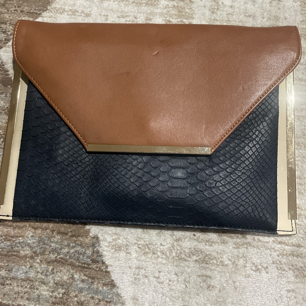 Aldo Tan and Black Clutch